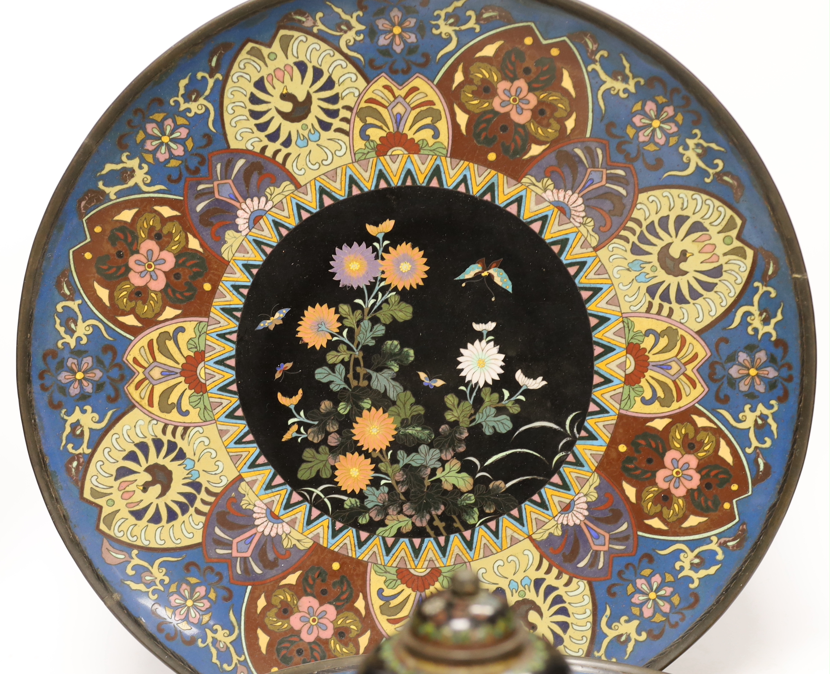 Two Japanese cloisonné enamel chargers and a finer cloisonne jar and cover on stand, largest 46cm (2)
